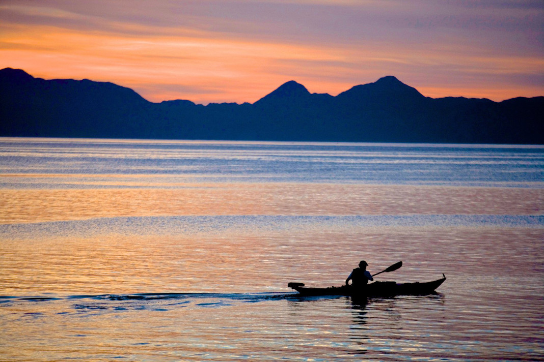 Paddler at sunset in Mexico.