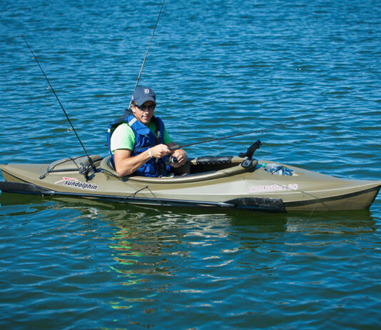 man fishes from the Sun Dolphin Excursion 10 kayak