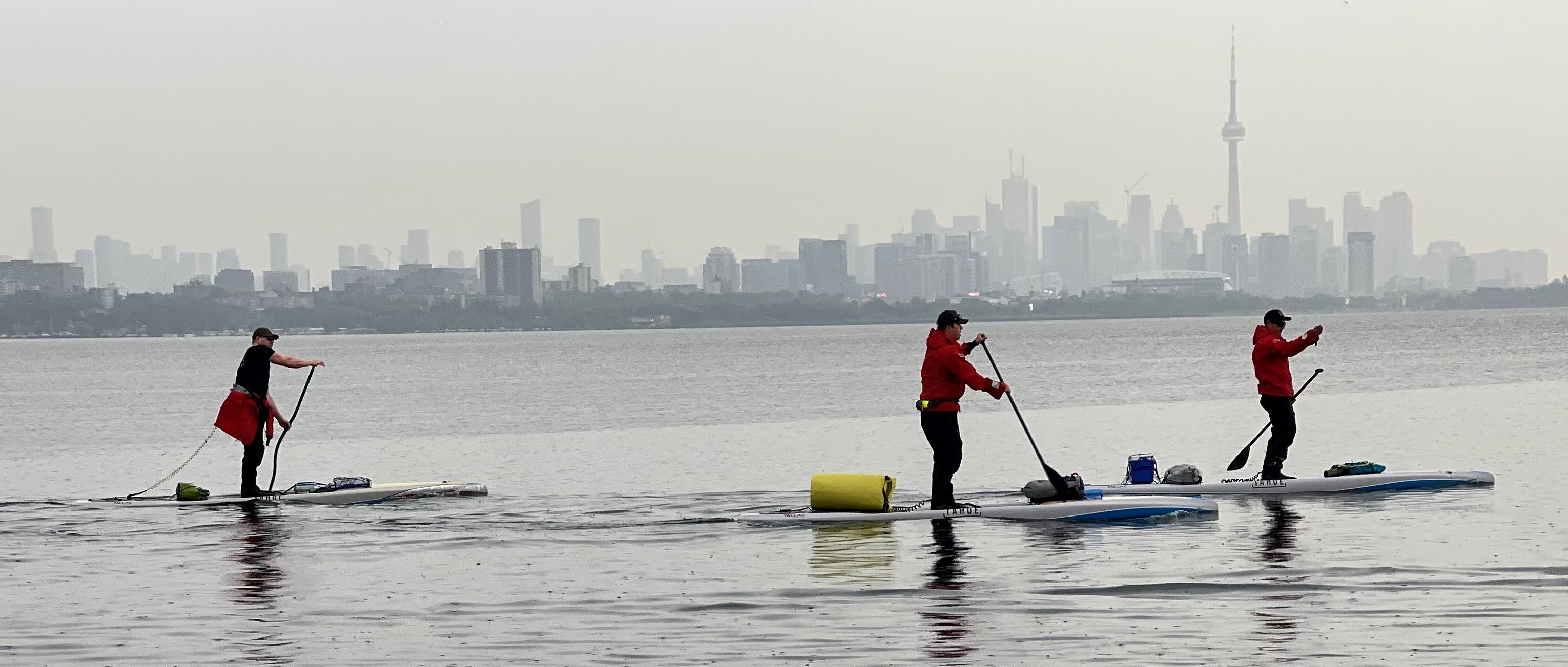 Joe Lorenz, Jeff Guy, Kwin Morris after departing from Toronto on Lake Ontario heading for Fort Niagara. The paddle was a 35 mile 13 hour journey on Friday, June 9, 2023.