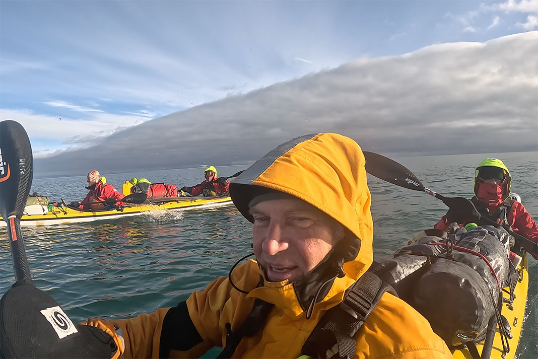 a brief sunny spell as the Arctic Cowboys paddle their kayaks through the Northwest Passage