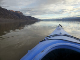 Kayak on Badwater Basin in Death Valley, California.