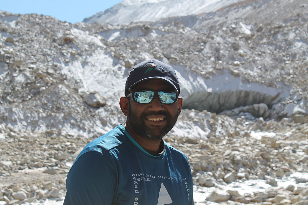 Rency Thomas poses for a photo while hiking in India