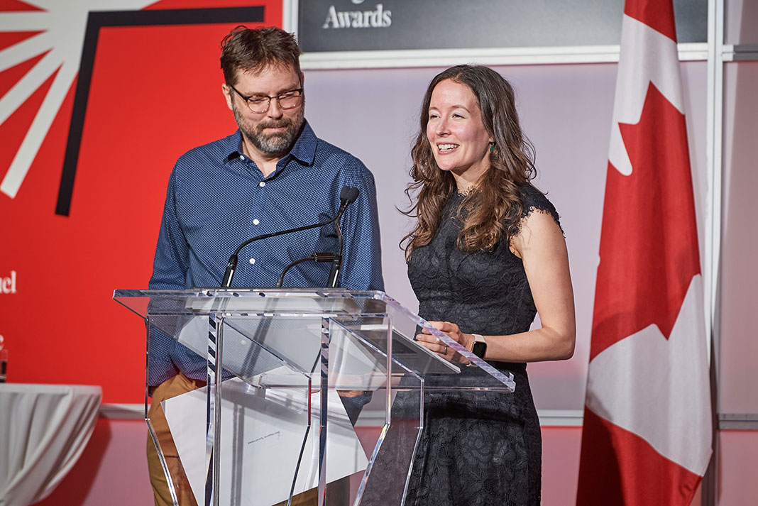 Art director Michael Hewis and editor-in-chief Kaydi Pyette proudly accept the Grand Prix for 2024