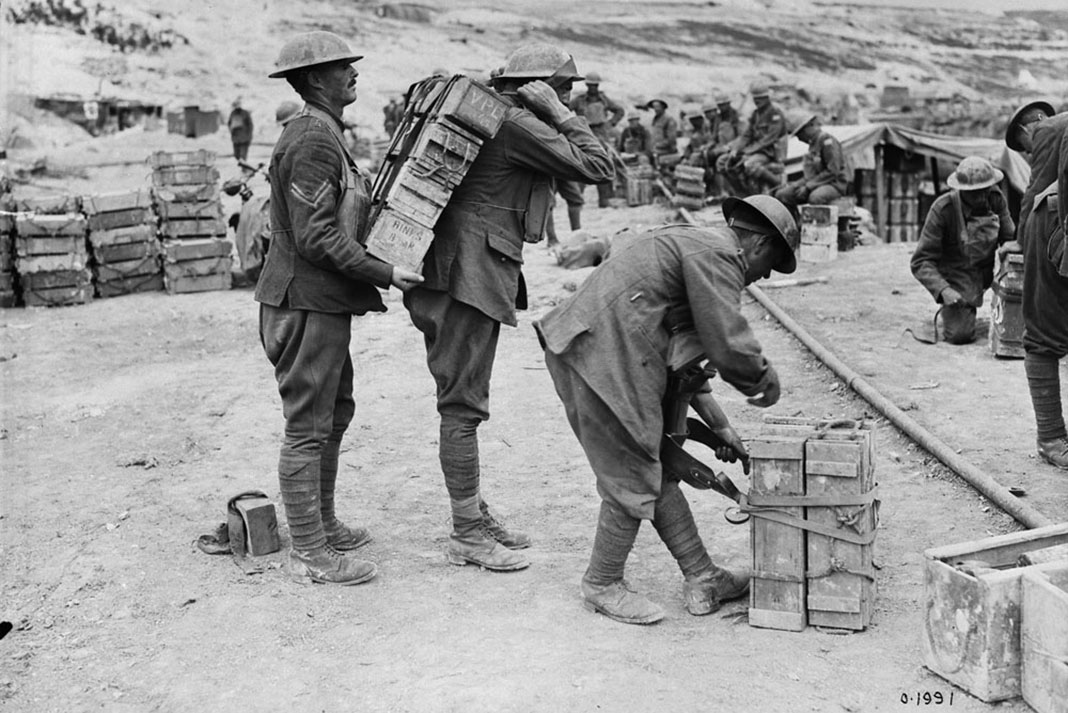 Canadian soldiers use a tumpline to transport supplies in WWI