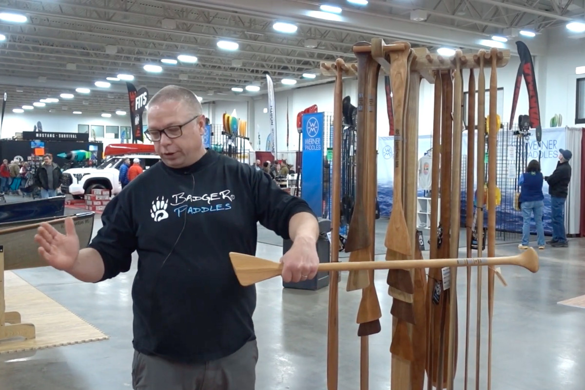 Mike Ramsay with canoe paddle sizer.