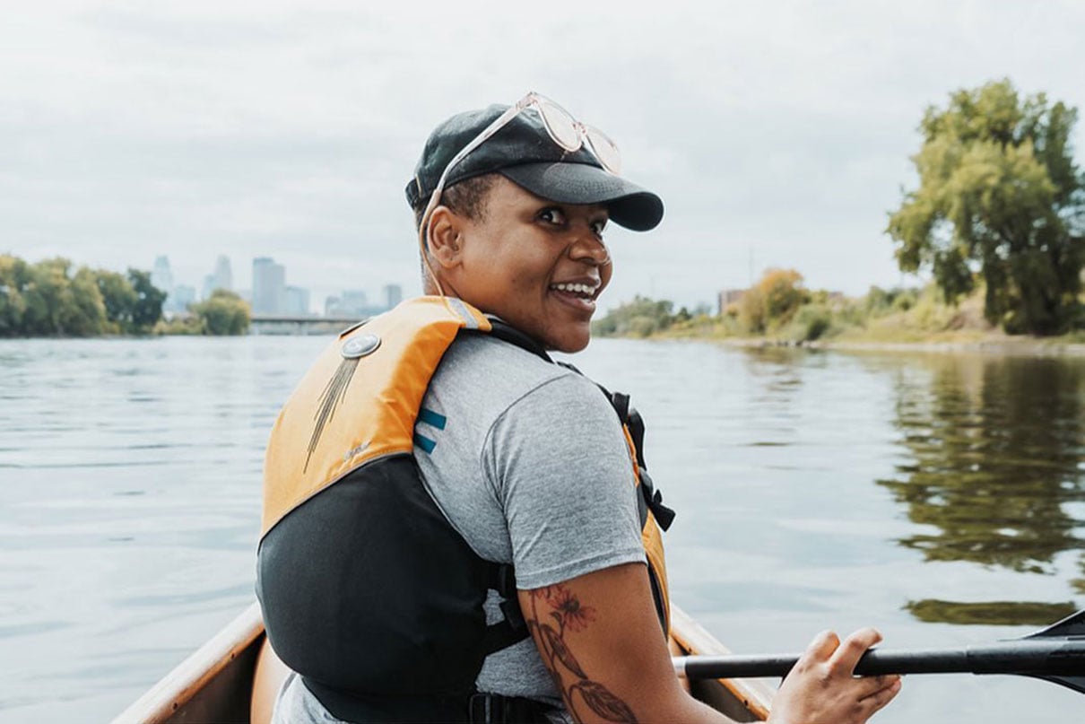 Devin Brown poses in her kayak