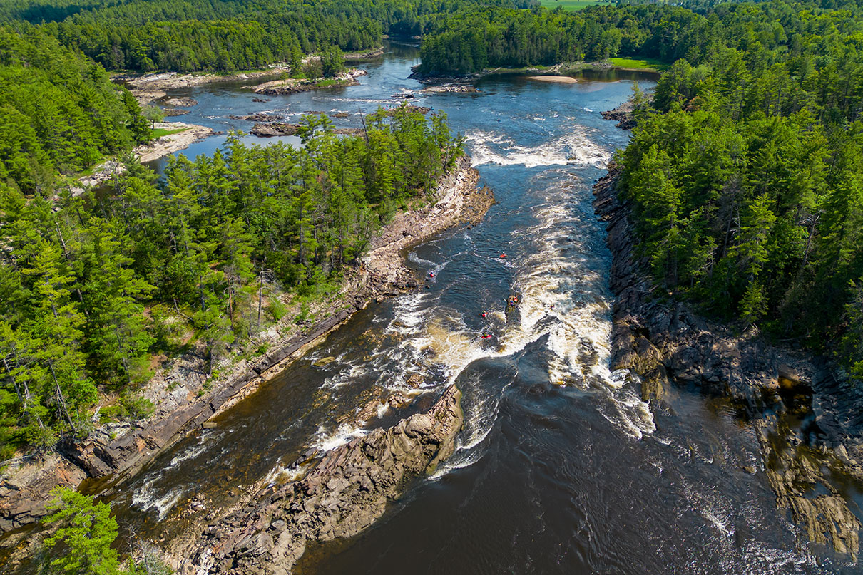 overhead view of people paddling through rapids on the Ottawa River