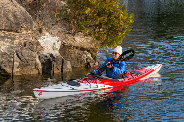 woman paddling the Norse Kayaks Ask touring kayak