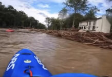 Kayakers paddle river to reach people stranded by Hurricane Helene.